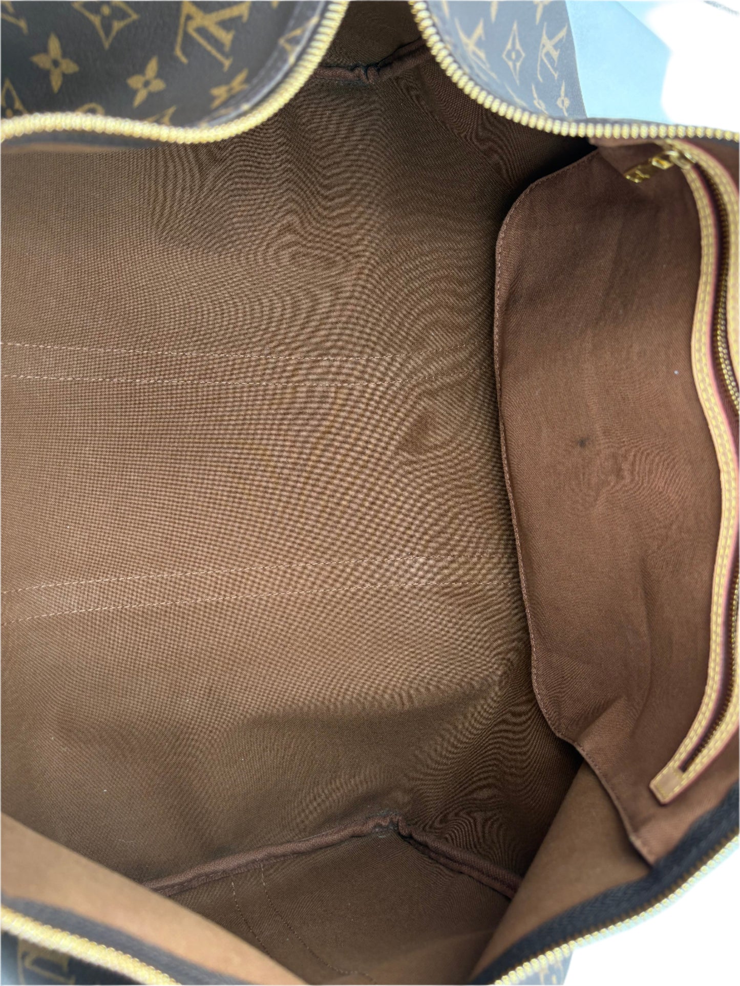 Chipped Louis Vuitton Keepall Bandouliere 50 Monogram